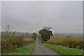 Narrow road leading north from the A47