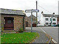 NY4335 : Bus shelter and pub, Skelton village by Rose and Trev Clough