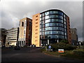 SZ0991 : Bournemouth: brand new buildings on St. Swithun’s Roundabout by Chris Downer