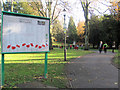 SP9211 : The Notice Board and Path to the Pond in the Memorial Garden, Tring by Chris Reynolds