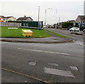 Yellow grit box on a suburban corner, Bridgend