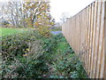 Enclosed footpath approaching Chester Road (A56) at Netherton