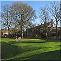 TF6119 : King's Lynn: in the Minster churchyard by John Sutton