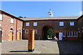 Entrance arch to the stable block at Sledmere House