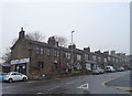 Launderette and terraced housing on Canada Road, Rawdon