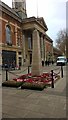TL1998 : Poppies at the war memorial on Bridge Street, Peterborough by Paul Bryan