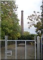 Main gate and chimney of the disused Drumnascamph Flax Mill