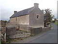 Former farmhouse converted into an agricultural store