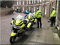 TF4609 : Police motorcycle outriders killing time in The Crescent, Wisbech by Richard Humphrey