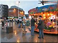 SJ9494 : Carousels on Hyde Civic Square by Gerald England