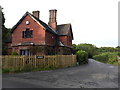 The lodge and entrance to Lyne House