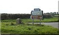 SW9546 : Old milestone and modern sign, near Pittsdown by David Smith
