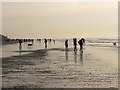 SD2606 : Formby Point, walkers seen against the light by David Hawgood
