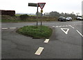 Give Way sign and hydrant marker on a grass triangle, Bisley