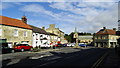 NU2406 : Warkworth - village centre & view to St Lawrence's Church by Colin Park