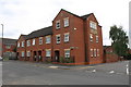 Housing block on Victoria Street at Vine Street junction