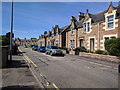 Houses and cars in Planefield Road, Inverness