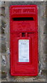 Queen Elizabeth II postbox in the wall of the Queen Victoria, Cwmbach