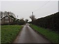 Looking along minor road to Saham Toney