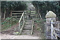 Wooden footpath steps and stile