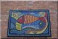 View of a mosaic of a fish on the wall of Somers Town Children