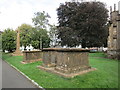 Table tombs and War Memorial in the churchyard, Chard