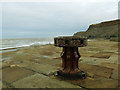 NZ9011 : Old capstan on Whitby east pier by Stephen Craven
