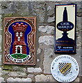 Three signs on a wall of the Bear Inn, Bisley