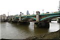 TQ3280 : Southwark Bridge over the River Thames by Steve Daniels