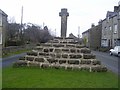 Old Central Cross on the village green, Carperby