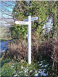 SW9865 : Old Direction Sign - Signpost by the B3274, Treliver by Milestone Society