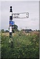 NY5056 : Old Direction Sign - Signpost, north of How by Milestone Society