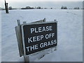 ?Please keep off the grass? sign