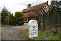 TM1697 : Old Milestone by the B1113, Norwich Road, Wreningham parish by CW Haines