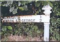 Direction Sign - Signpost at Hut Gate on the A356