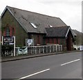 White-on-black nameboard in Ynysboeth