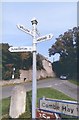 Direction Sign - Signpost at the crossroads in Combe Hay