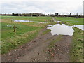 TQ2453 : Waterlogged track, near Lower Kingswood by Malc McDonald