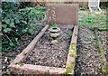 The church of All Saints in Postwick, churchyard