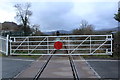 SH7871 : Level crossing gate at Tal-y-Cafn by Richard Hoare