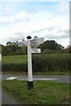 Direction Sign - Signpost at the junction of the A22 and Tylers Lane