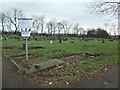 SE3121 : Notices in St Paul's churchyard, Alverthorpe by Christine Johnstone