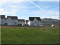 NT2767 : New houses at Burdiehouse by M J Richardson