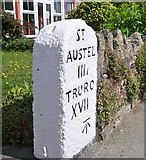 SX0653 : Old Milestone by the A390, Doubletrees, St Blazey Gate by Ian Thompson