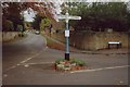 Direction Sign - Signpost on Lombard Street in Shackleford