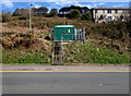 Steps up to a green cabinet above Caerphilly Road, Senghenydd