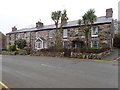 Row of stone cottages on the main road at Llwyngwril