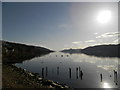 NH5934 : Loch Ness at Dores on a still evening by Douglas Nelson