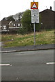 Humps bilingual warning sign, Oakland Terrace, Rhymney