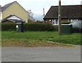 Two dark green cabinets on a corner of Libanus, Powys